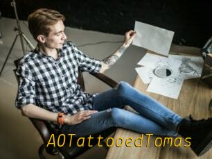 A0TattooedTomas